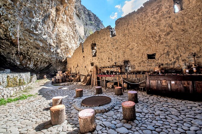 Group Tour: Haghpat, Zarni-Parni Caves, Akhtala, Aramyants Castle, Sanahin - Zarni-Parni’s caves, tools, and view toward Kayan Fortress